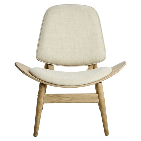 Beige fabric chair featuring a curved backrest and seat, supported by natural washed elm wood legs.