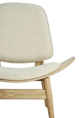 Beige fabric chair featuring a curved backrest and a comfortable seat, supported by a natural washed elm wood frame.