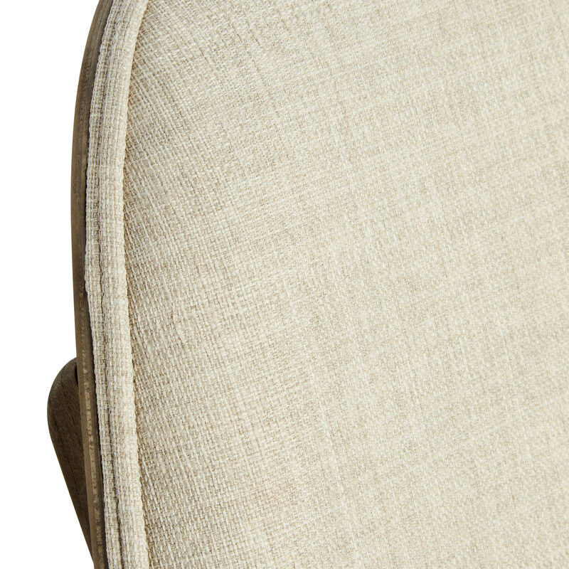 Beige fabric chair featuring a textured upholstery with a subtle weave pattern, complemented by a washed elm wood frame.