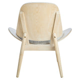 Grey fabric chair featuring a gently curved backrest and a washed elm wood frame.
