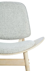 Grey fabric chair featuring a rounded backrest and a curved seat, supported by light washed elm wood legs.