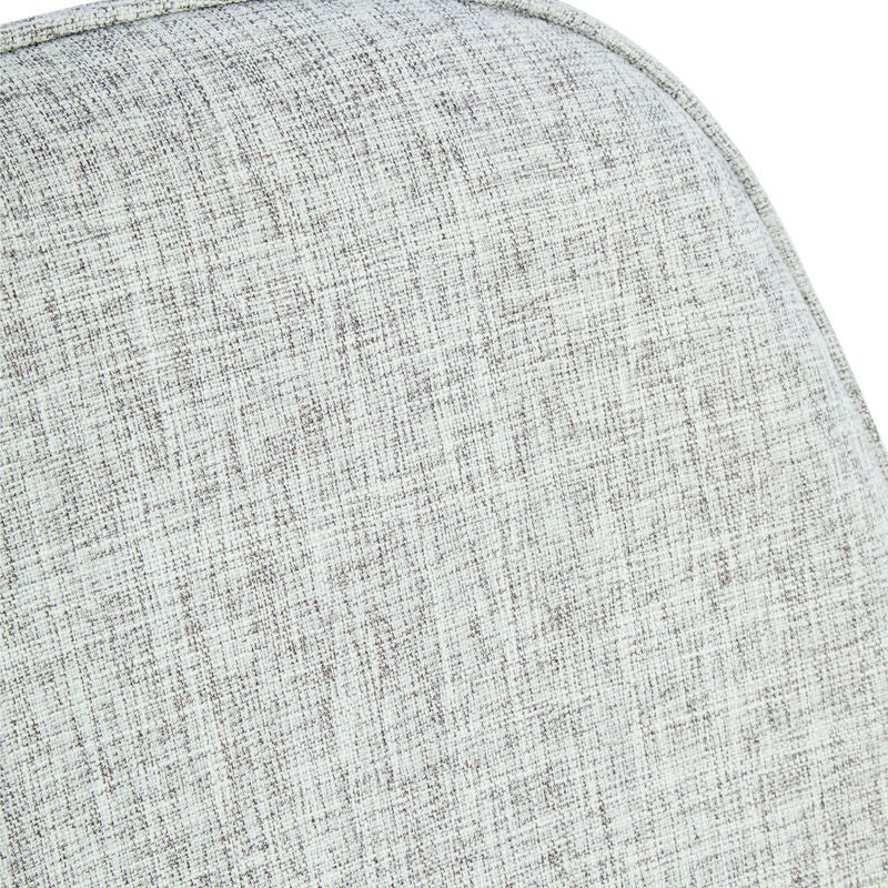 Close-up of the textured grey fabric upholstery of a chair, featuring a subtle woven pattern and rounded edges, highlighting the soft and inviting surface.