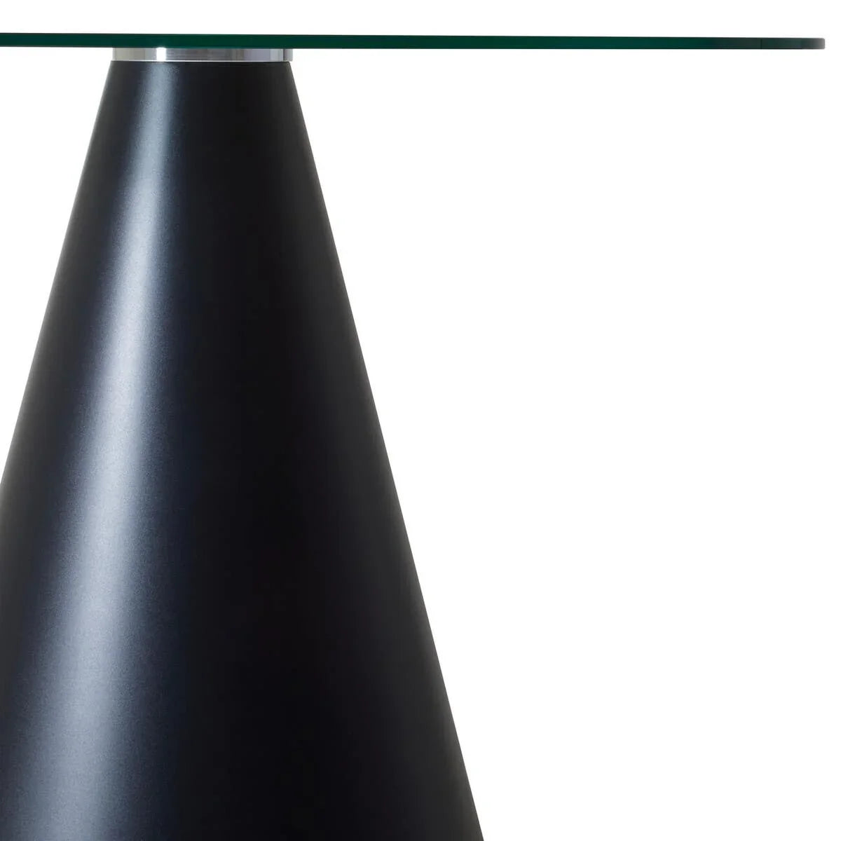 Black metal cone base with clear glass tabletop, modern dining table close-up