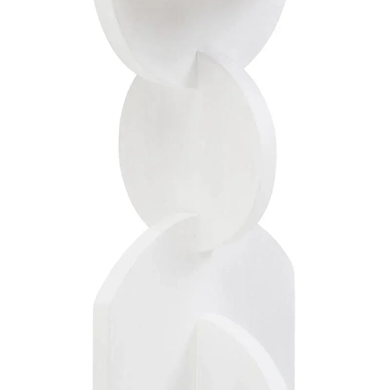 White side table with geometric design and round tabletop