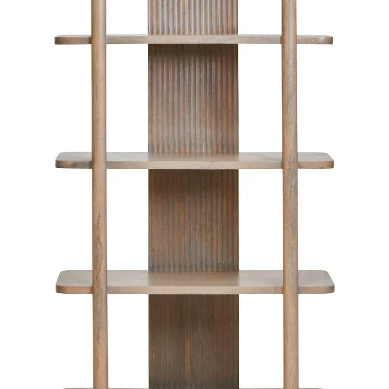 Light oak bookcase with four wide shelves and vertical fluted wooden panel