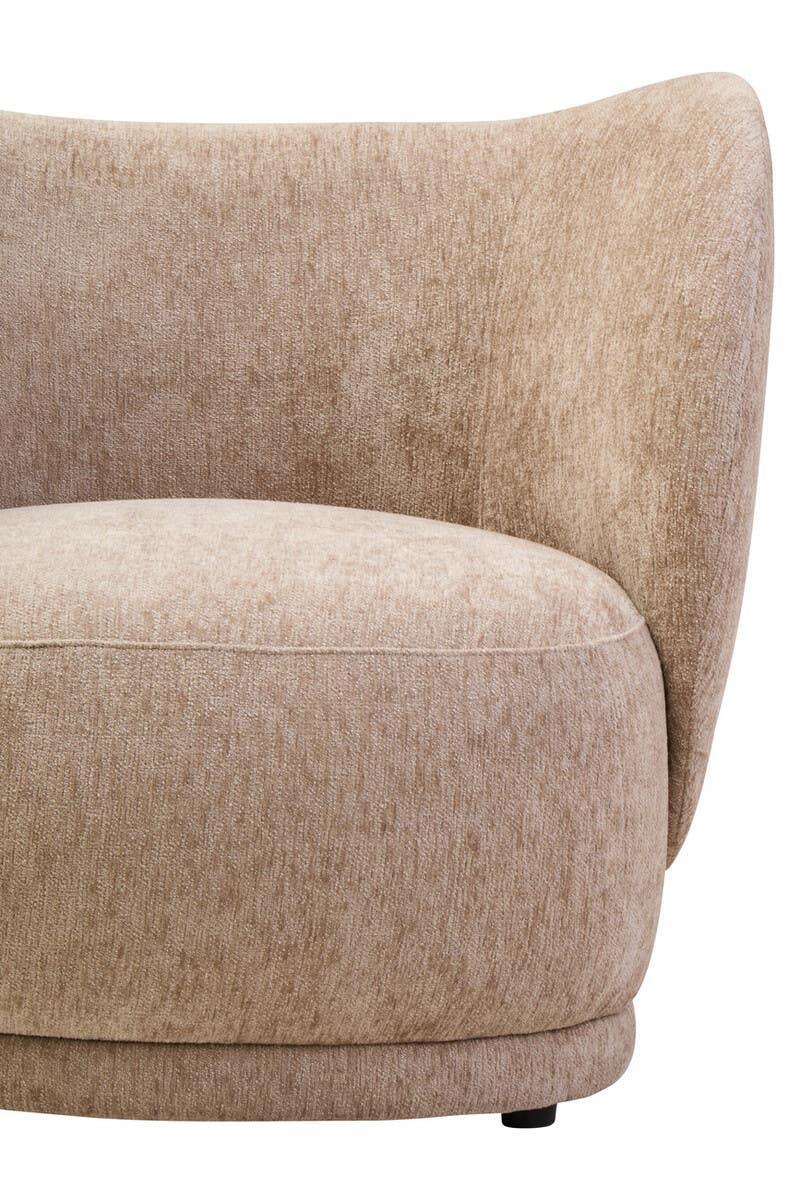 Close-up of beige fabric sofa with curved backrest and plush seat