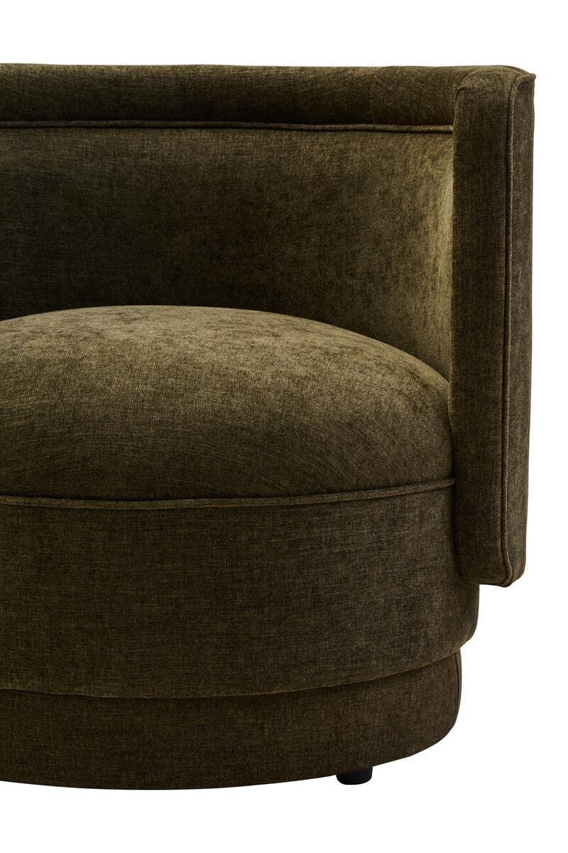 Olive green fabric accent chair with rounded back and soft cushioned seat, close-up view