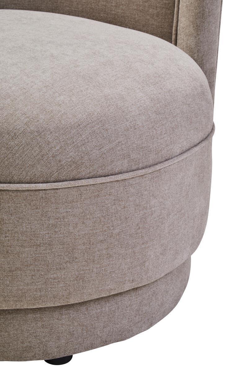 Close-up of beige fabric upholstered sofa seat with rounded edge