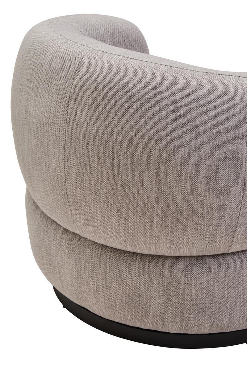 Curved grey fabric armchair backrest with textured upholstery and black base detail