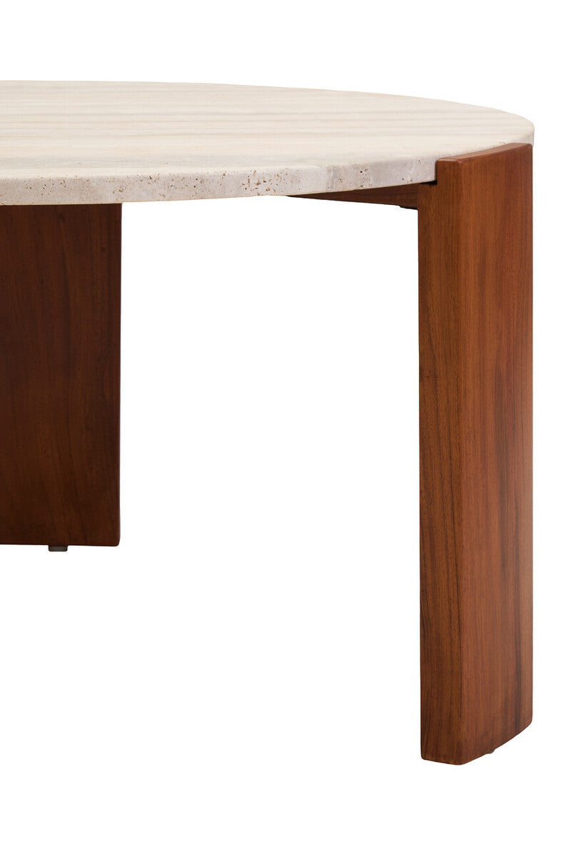 Round coffee table featuring a natural travertine marble top with subtle texture and a warm acacia wood base.