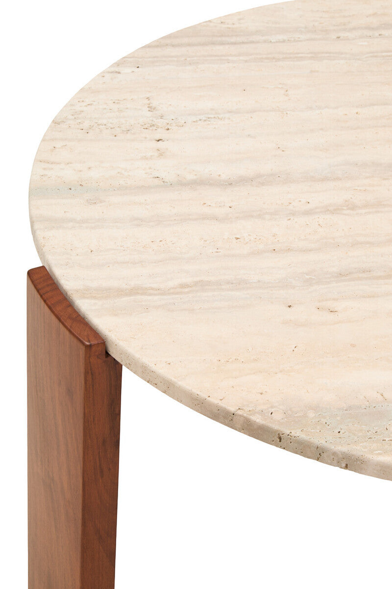 Round coffee table featuring a natural travertine marble top with subtle veining, complemented by sturdy acacia wood legs.