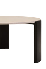 Round coffee table featuring a cream marble top with a smooth finish, supported by sleek black acacia wood legs.