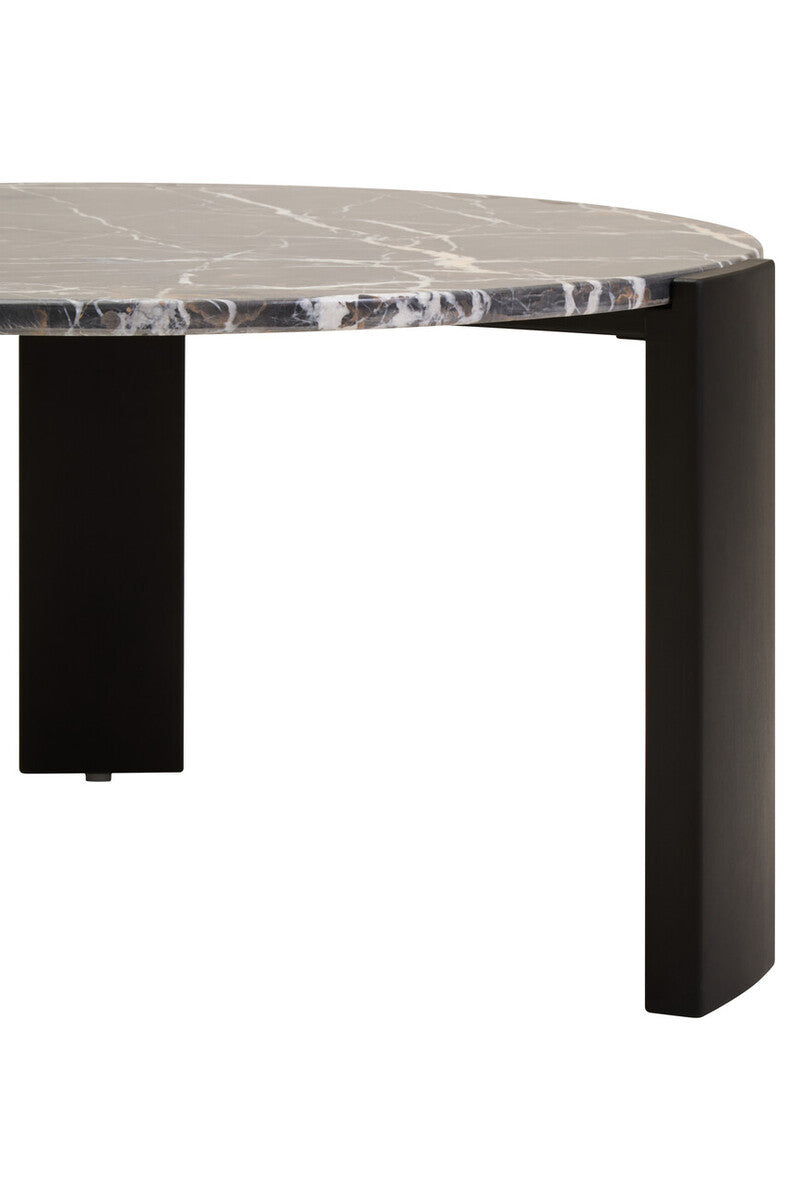 Round coffee table featuring a luxurious black and gold marble top with striking white veining. The sturdy base is crafted from dark acacia wood, providing a modern contrast.