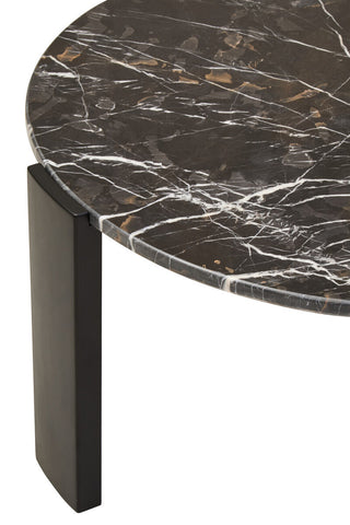 Round coffee table featuring a luxurious black and gold marble top with striking white veining, complemented by sleek black acacia wood legs.