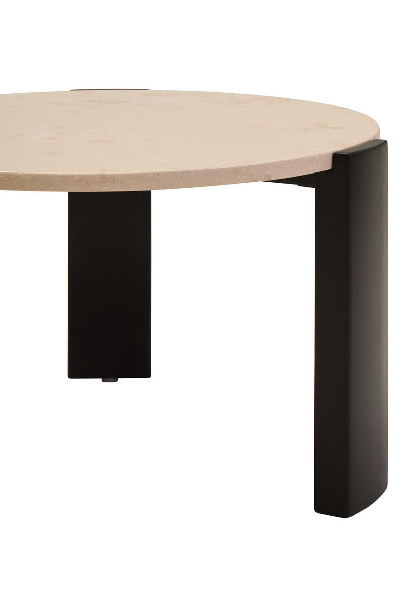 Round cream marble top coffee table featuring a smooth surface and sleek black acacia wood legs.