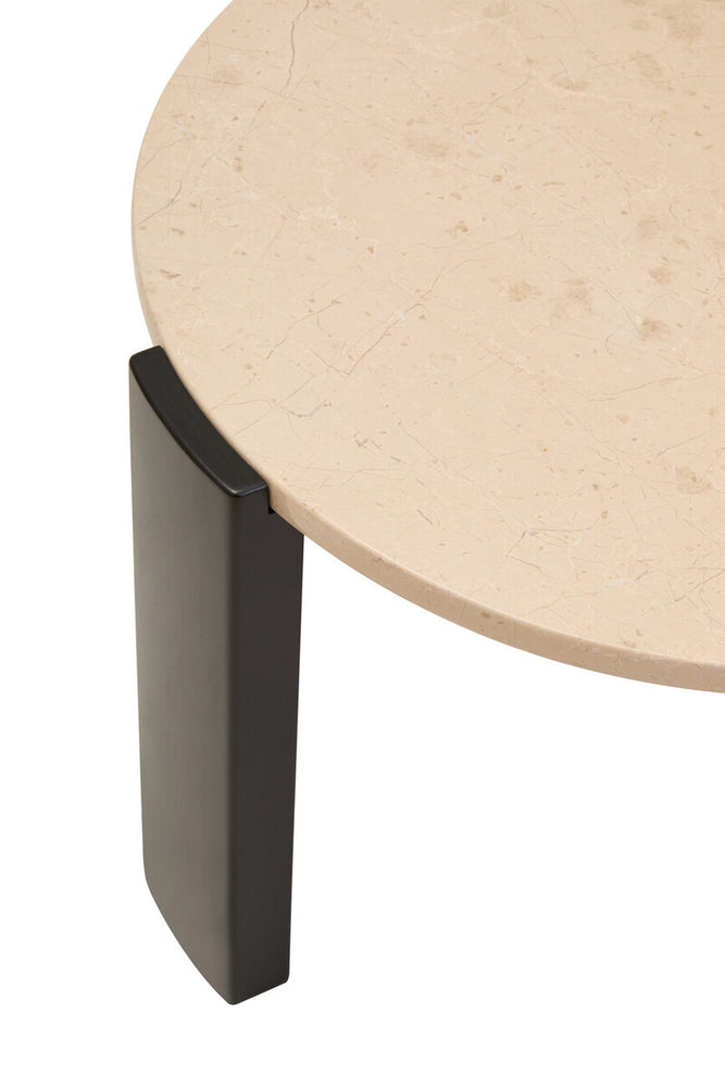 Round cream marble top coffee table featuring a smooth, textured surface with subtle veining, supported by sleek black acacia wood legs.