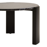 Round black marble top coffee table featuring a sleek design with a smooth surface and subtle white veining.