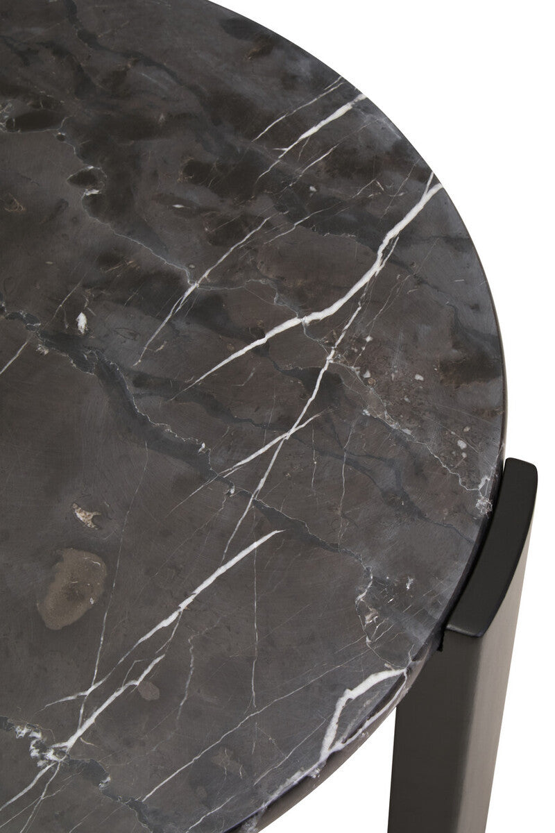 Round black marble tabletop featuring striking white veining, complemented by sleek black acacia wood legs.