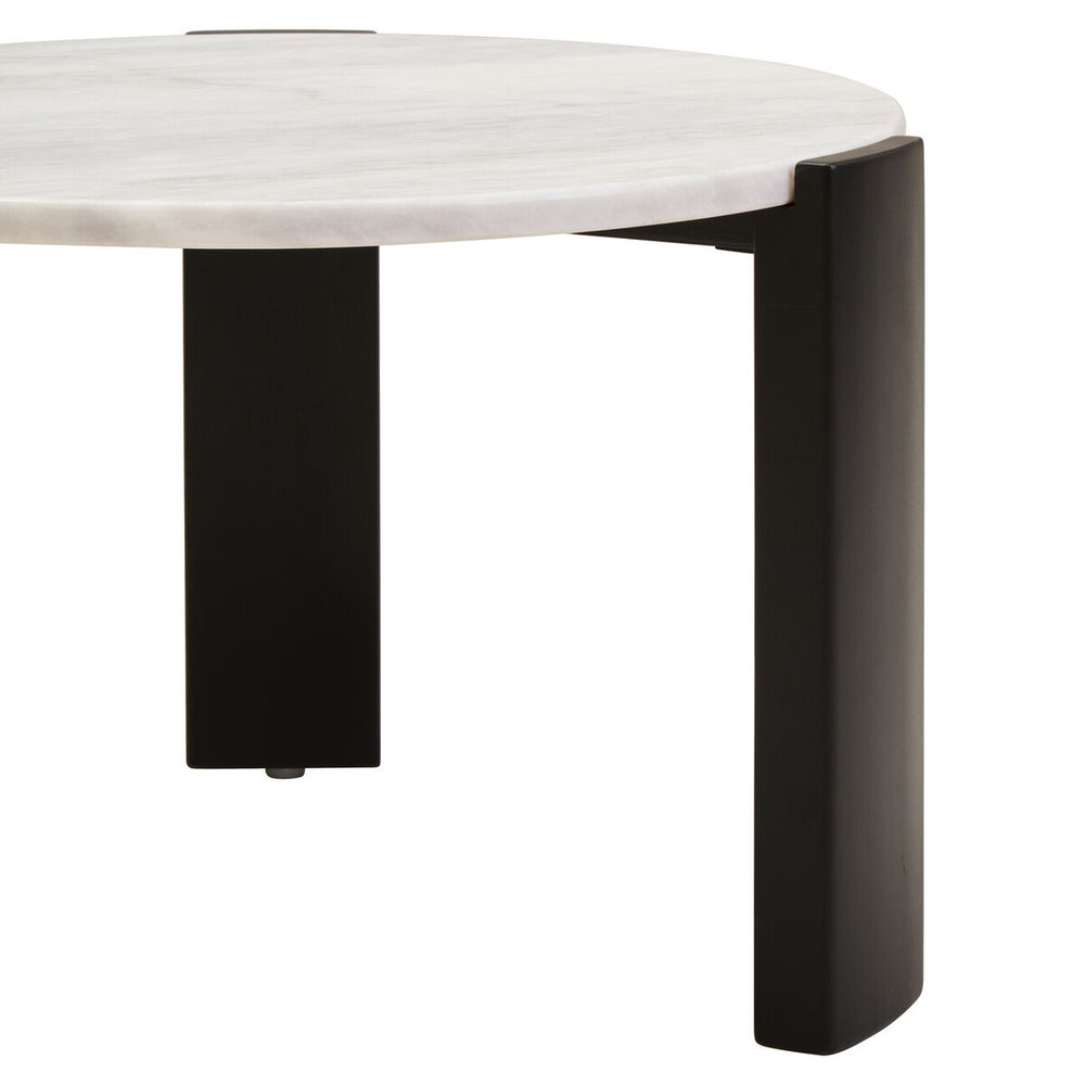 Round coffee table featuring a smooth white marble top and sleek black acacia wood legs.
