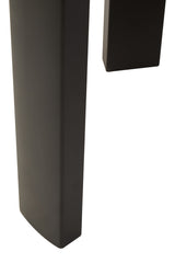 Close-up view of a black acacia wood leg of a round side table, showcasing its smooth finish and slightly rounded edges.