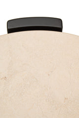 Round side table featuring a cream marble top with subtle veining and a sleek black handle.