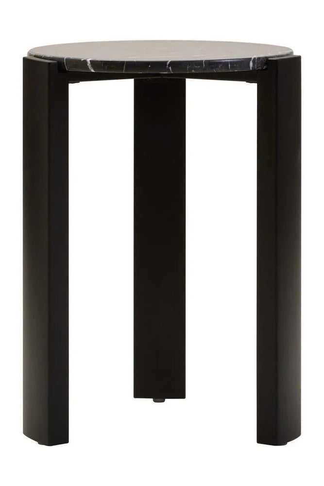 Round black side table with marble top and three wide legs