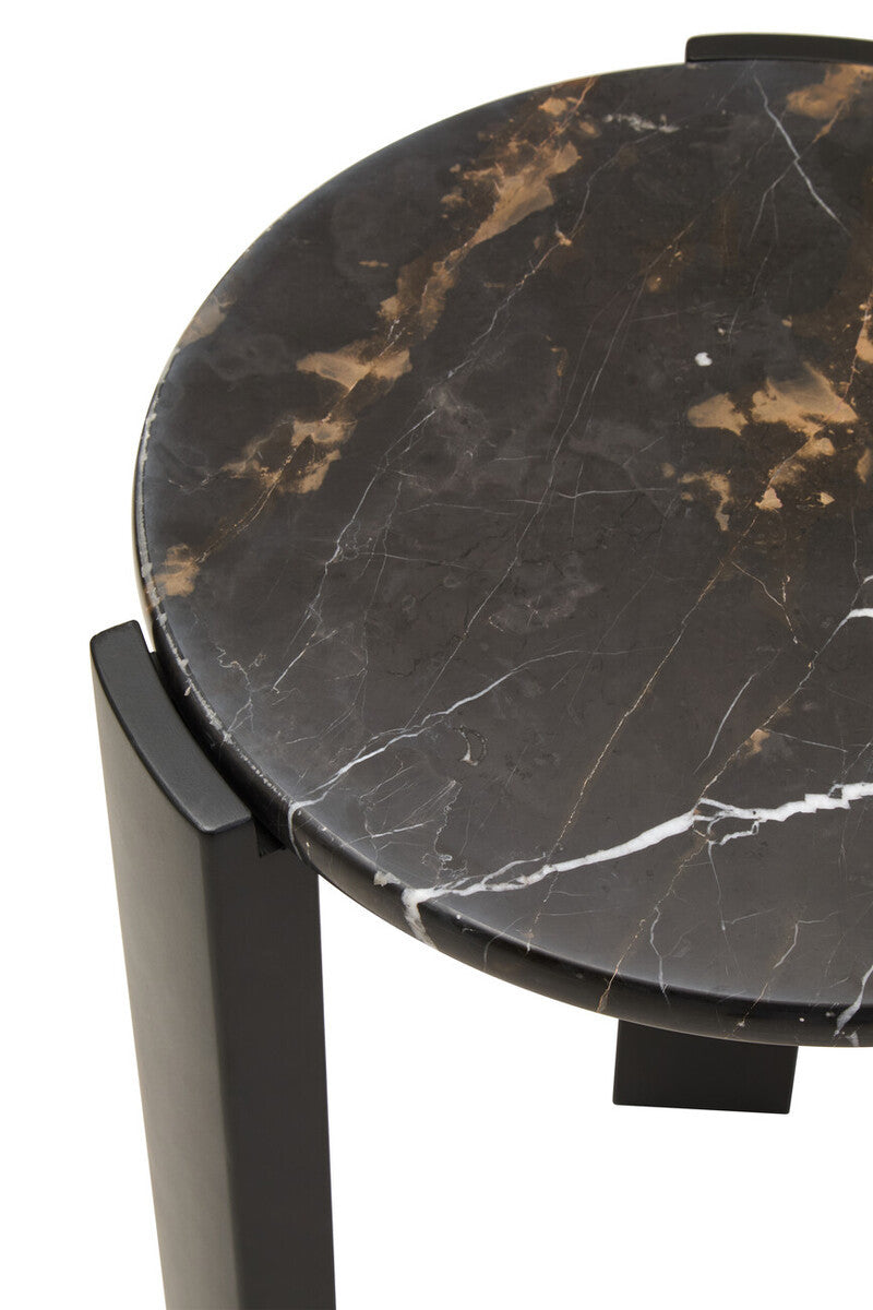 Round side table featuring a sleek black marble top with striking gold and white veining, supported by sturdy black acacia wood legs.