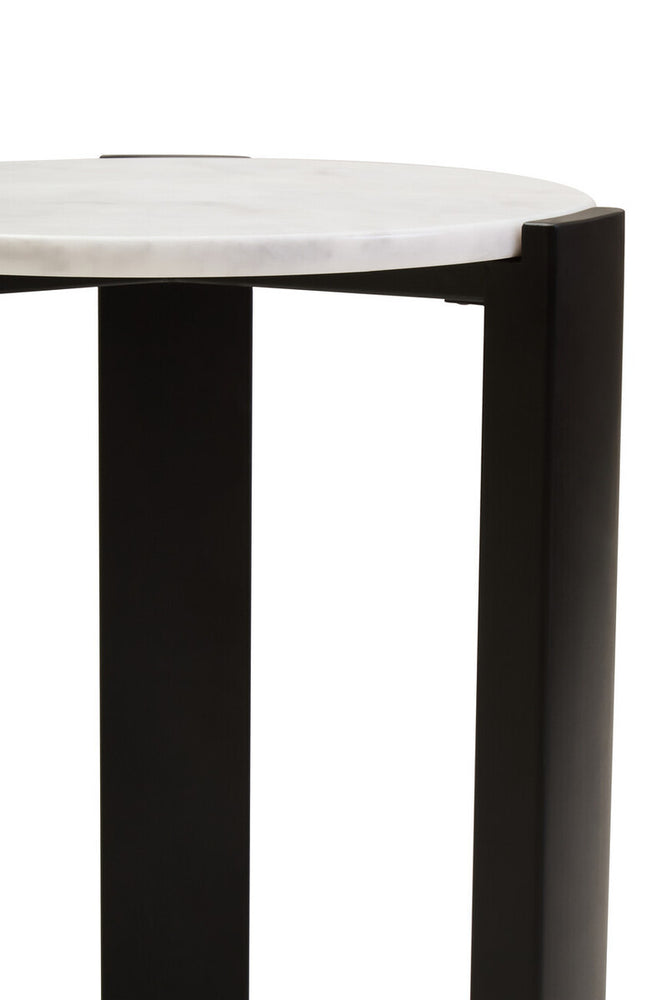 Round side table featuring a sleek white marble top with subtle veining, supported by sturdy black acacia wood legs.