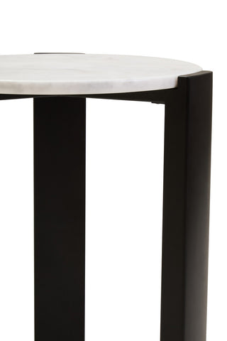 Round side table featuring a sleek white marble top with subtle veining, supported by sturdy black acacia wood legs.