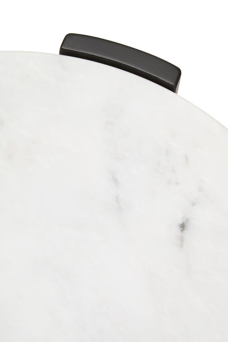 Round side table featuring a smooth white marble top with subtle gray veining, complemented by a sleek black handle.
