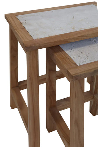 Wooden nest of tables with stone inlay tops, side view