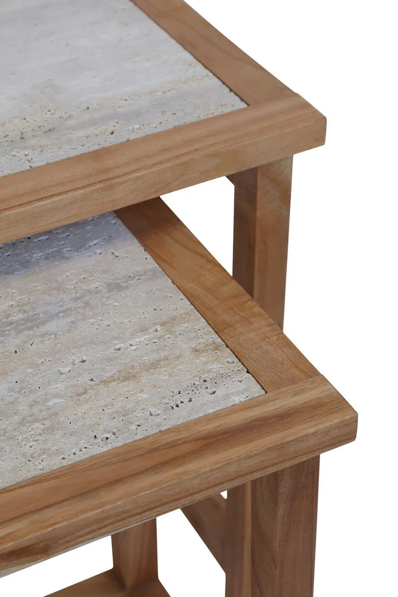 Closeup of nested side tables with solid wood frames and stone tops