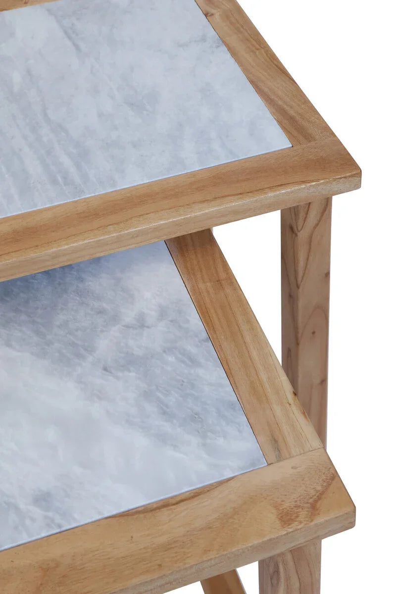 Side table with natural wood frame and marble effect shelves, detail closeup