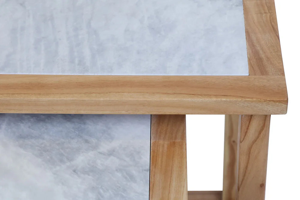 close-up of marble top table with natural wood frame and leg corner detail