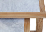 close-up of marble top table with natural wood frame and leg corner detail