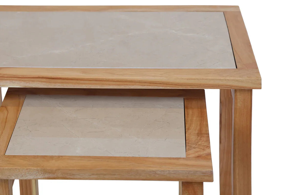 Set of nesting tables with light wood frames and beige marble tops