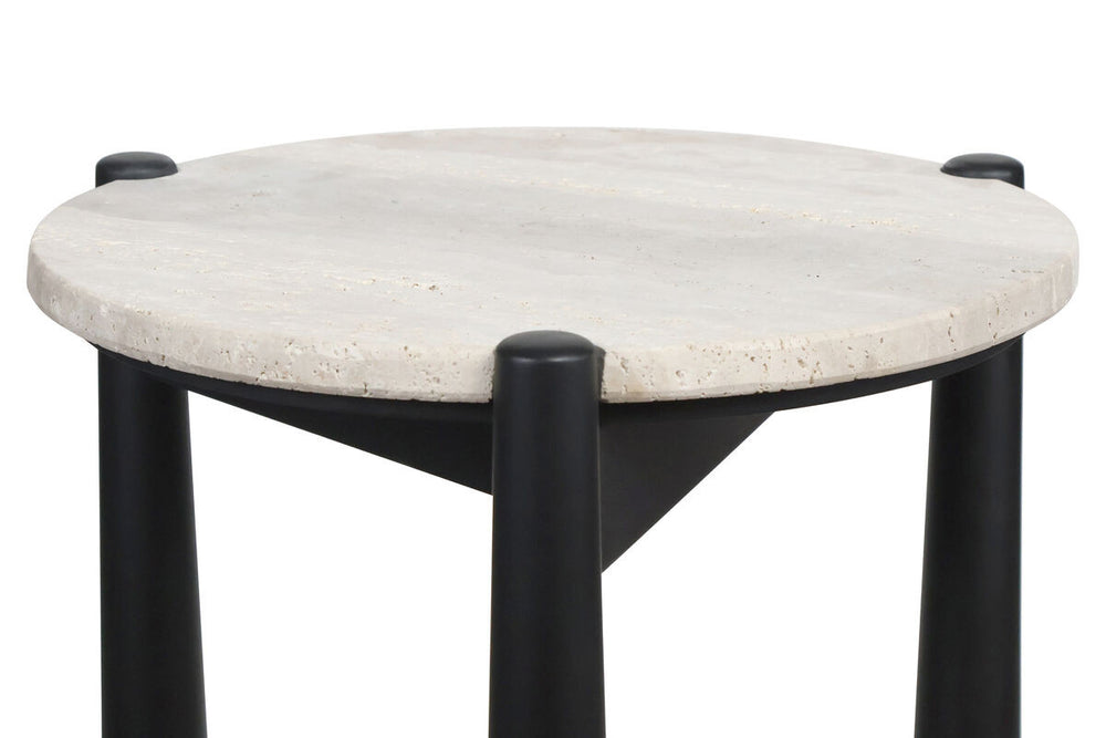 Round travertine top with a textured surface, supported by sleek black mango wood legs.