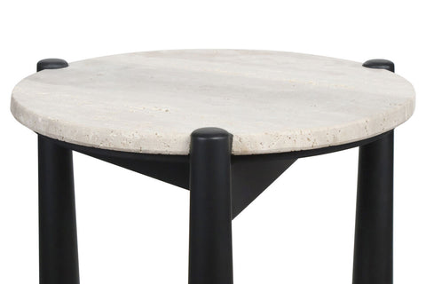 Round travertine top with a textured surface, supported by sleek black mango wood legs.