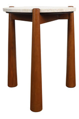 Round side table featuring a natural travertine top with a textured surface, supported by four sturdy, tapered brown mango wood legs.
