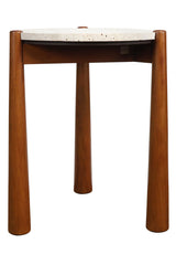 Natural travertine top side table with a smooth, round surface, supported by four sturdy, tapered brown mango wood legs.