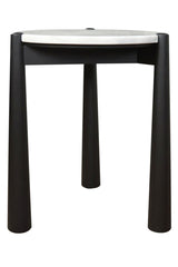 Round side table featuring a sleek white marble top and a sturdy black mango wood base. The table stands on four cylindrical legs, providing a modern aesthetic.