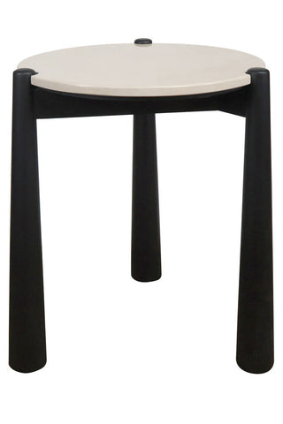 Cream marble top side table with a sleek, round surface and a central decorative knob, supported by four sturdy black mango wood legs.