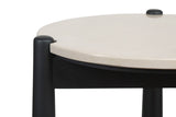 Cream marble top side table featuring a rounded surface and smooth edges, supported by sturdy black mango wood legs.