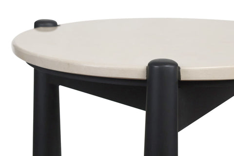 Cream marble top side table featuring a sleek round surface with smooth edges, supported by sturdy black mango wood legs.