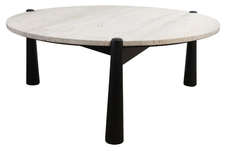 Round coffee table featuring a smooth travertine top with subtle texture and natural tones, supported by four sleek black mango wood legs.