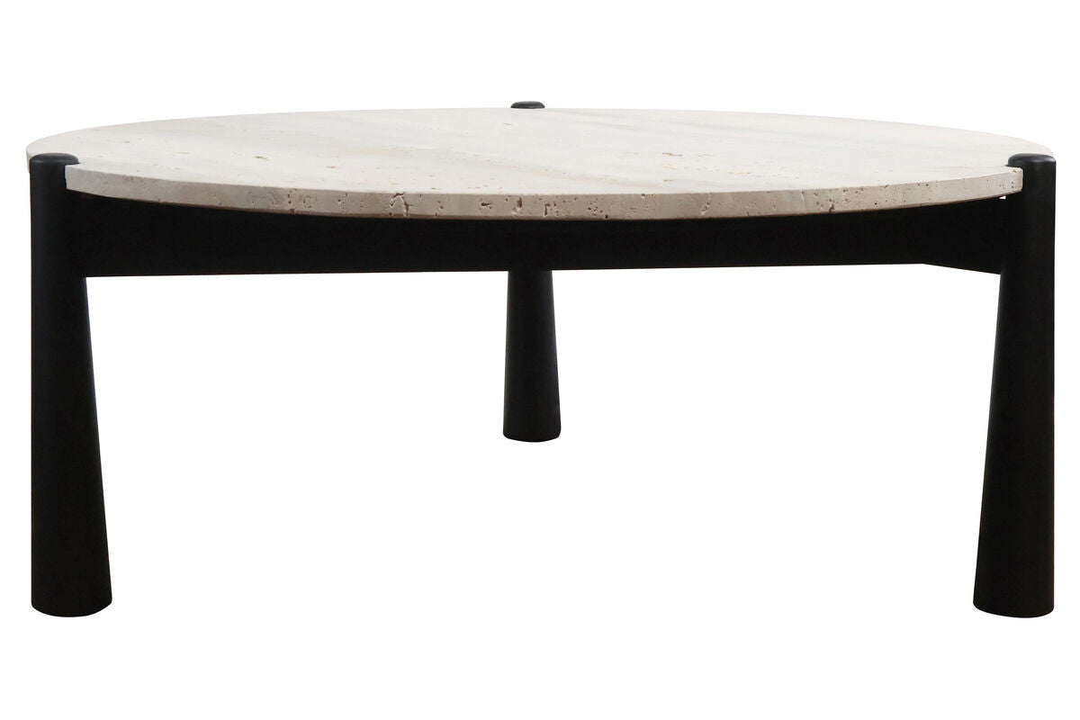 Round coffee table featuring a natural travertine top with subtle texture and a sleek black finish on the mango wood legs.