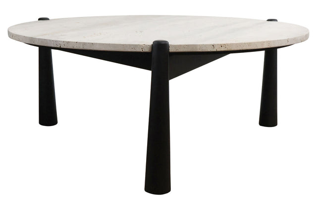 Round coffee table featuring a natural travertine top with a textured surface, supported by sleek, tapered black mango wood legs.