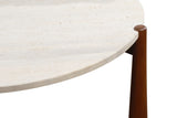 Round coffee table featuring a smooth travertine top with a natural finish, supported by sleek brown mango wood legs.
