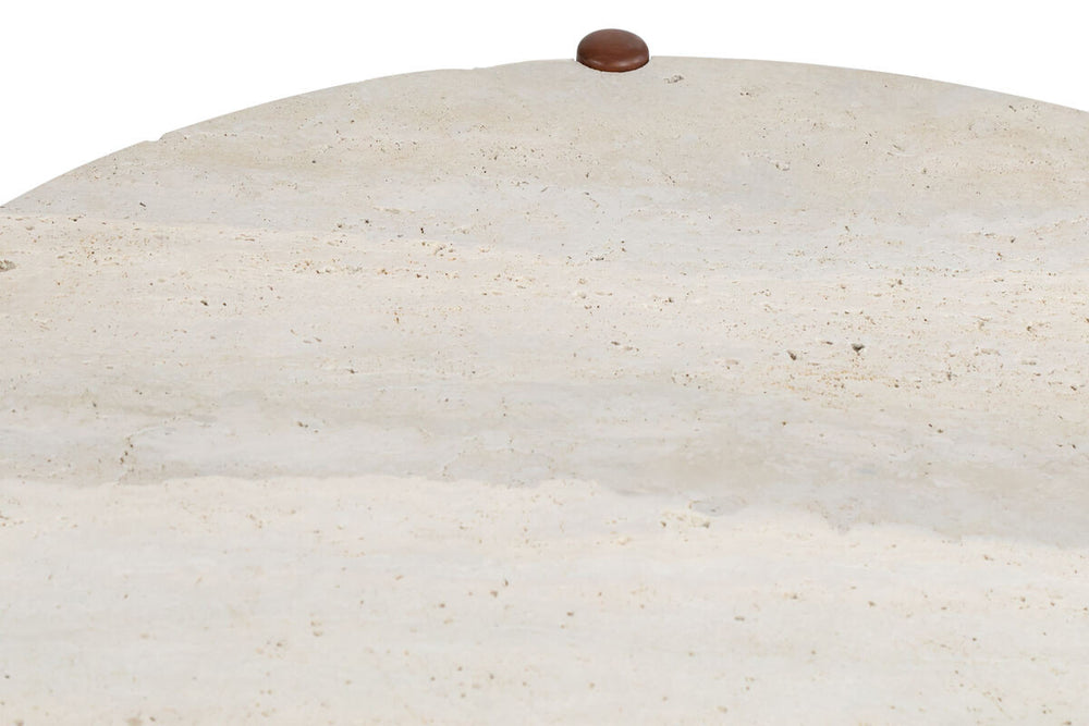 Round travertine tabletop featuring a smooth, natural stone surface with subtle variations in color and texture, complemented by a small brown accent.