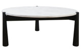 Round coffee table featuring a sleek white marble top and a sturdy black mango wood base. The table stands on three tapered legs, providing a modern aesthetic.